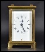 An early 20th century brass carriage clock with inset French movement marked for Duverdrey  &