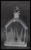 A vintage 20th century Orrefors decanter designed by Edward Hald (1921) engraved by Zaglo showing