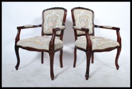 A pair of 20th century Louis XV French  fauteils / armchairs. Of beech construction with
