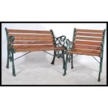 A very heavy 20th century cast metal garden bench and matching chair, recently having new wooden