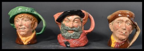 A group of three Royal Doulton Character jugs to i