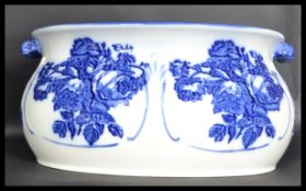 An antique style 20th century blue and white ceram