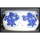 An antique style 20th century blue and white ceram