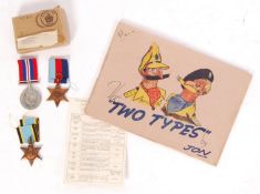 WWII MEDAL GROUP AND CARTOON BOOK