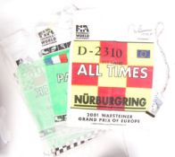 ASSORTED FORMULA ONE PIT CREW BIBS & AUTOGRAPHS