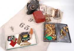 COLLECTION OF ASSORTED WWII MILITARIA