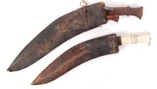 TWO ANTIQUE NEPALESE KUKRI KNIVES