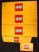 A collection of 5x Lego shop point of sale advertising card display banners having the yellow