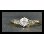 A hallmarked 18ct gold platinum and diamond ring h