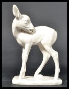 A Goebels ceramic figurine of a deer / faun raised