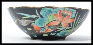 A 19th century Chinese hand painted bowl decorated