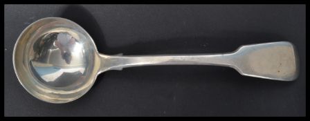 A hallmarked silver 19th century Georgian ladle in