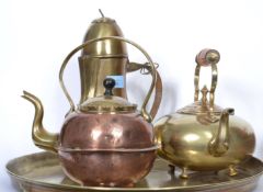A group of three vintage brass kettles / coffee po