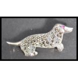 A sterling silver and marcasite brooch of a dachsh