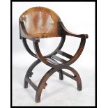 A mid 20th century Savonarola Italian throne chair