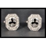 A pair of sterling silver cuff links cuffs of octa