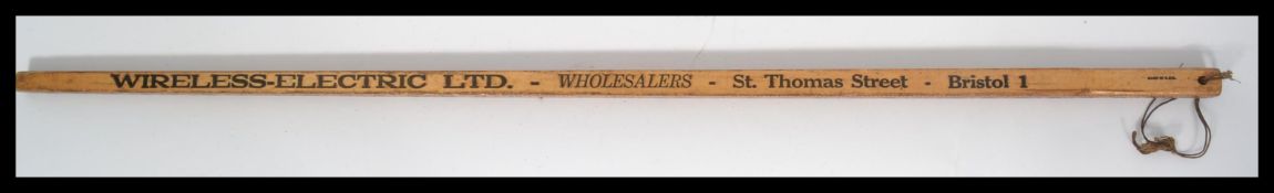 A vintage early 20th century advertising wooden ta