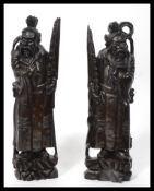 A pair of 19th century Chinese carved hardwood fig