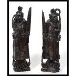 A pair of 19th century Chinese carved hardwood fig