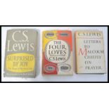 A group of three C.S. Lewis first edition hard bac