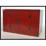 An early 20th Century Chinese plain  red lacquered