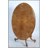 A 19th century Victorian burr walnut oval loo / br