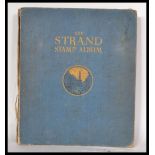 A Strand stamp album with strong collection of sta