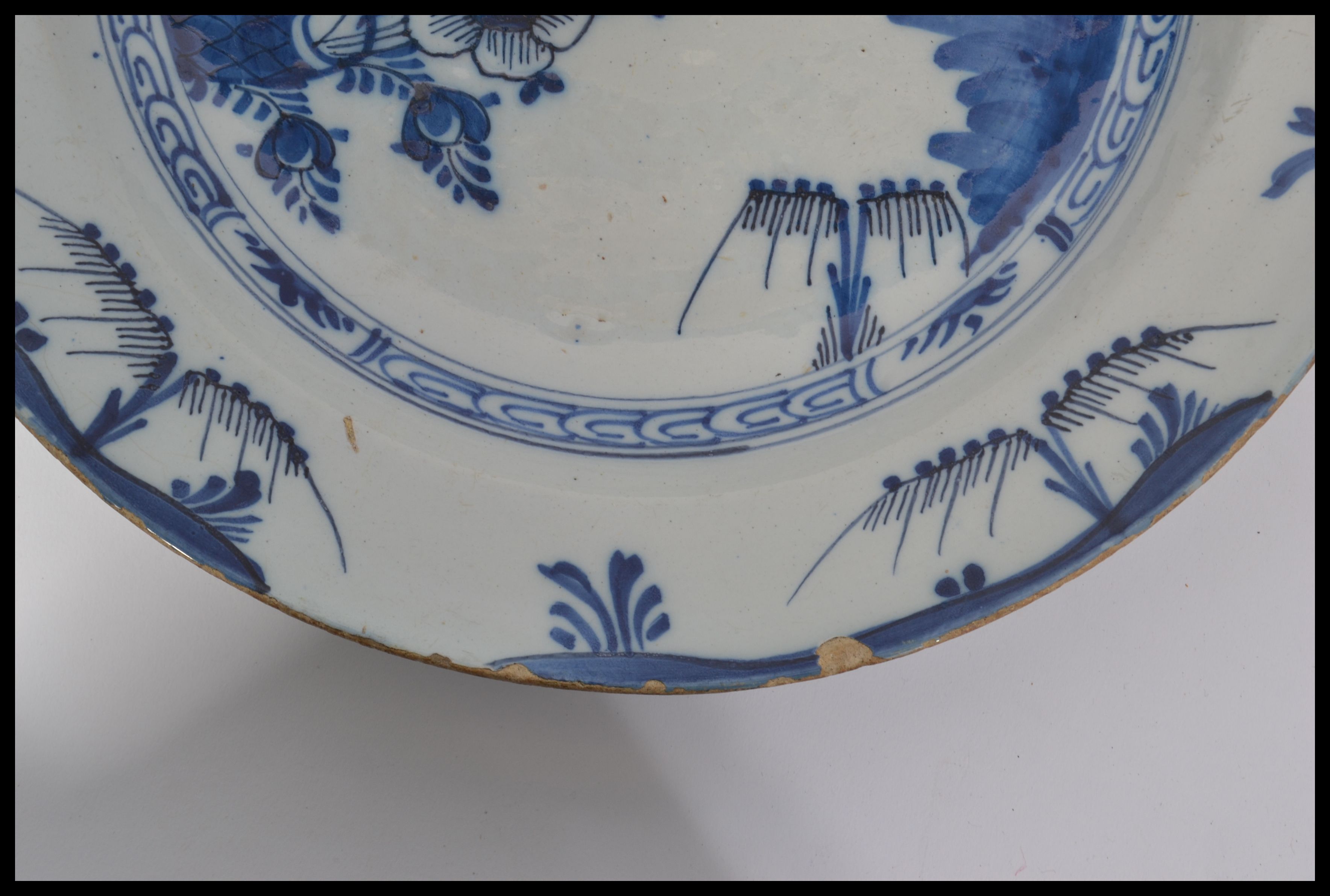 A mid 18th century English Delft pottery plate hav - Image 5 of 8