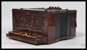 A vintage 20th century squeeze box accordion by Su