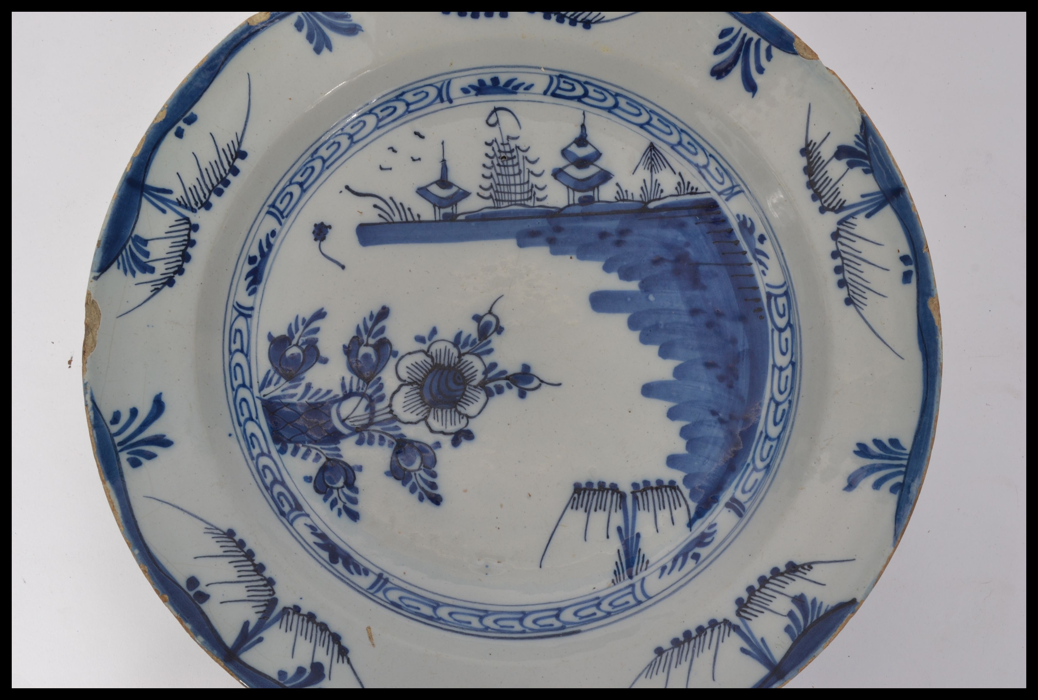 A mid 18th century English Delft pottery plate hav - Image 2 of 8