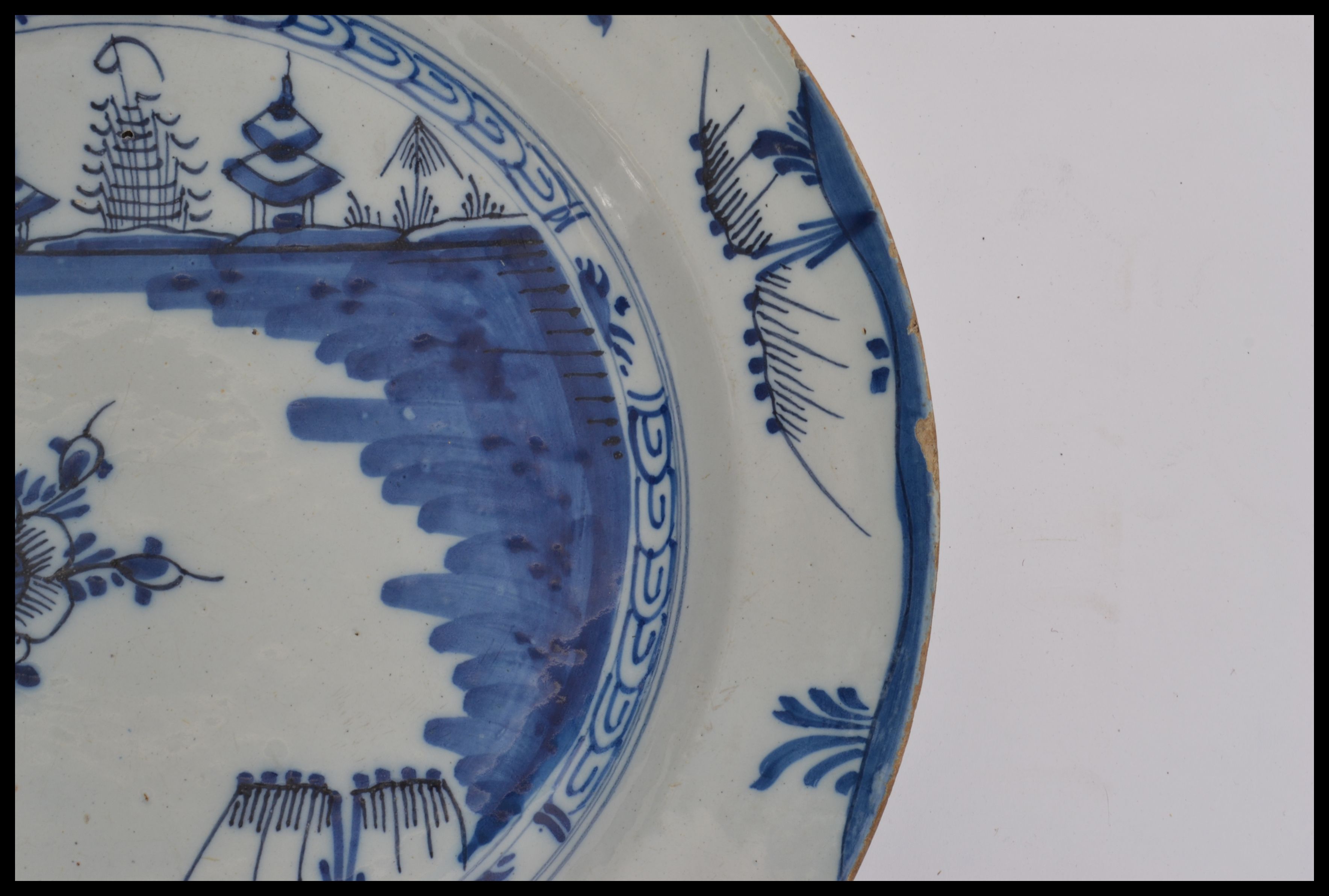 A mid 18th century English Delft pottery plate hav - Image 4 of 8