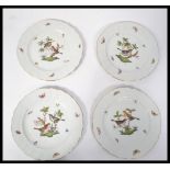 A group of four Herend porcelain cabinet plates ha