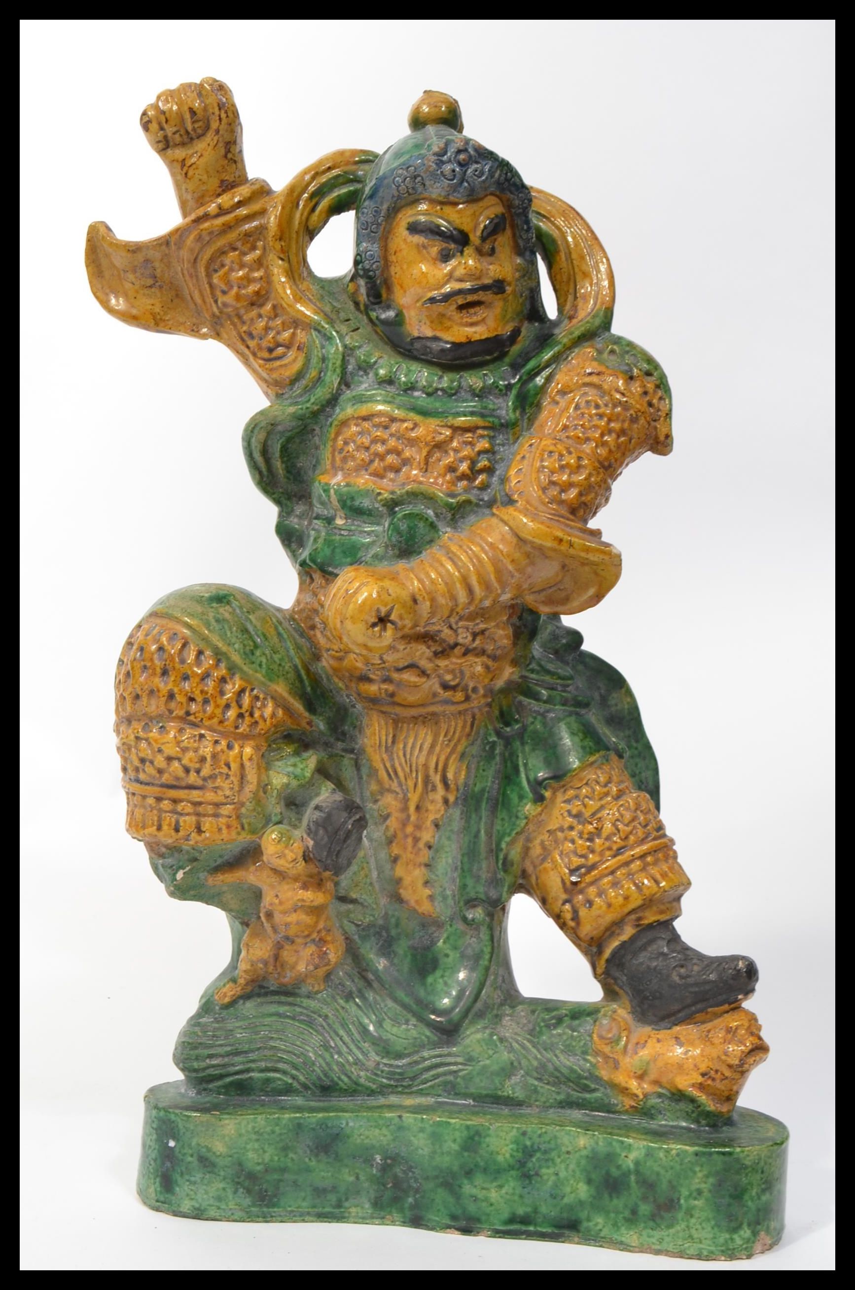 A large 19th century Chinese ceramic figure of a w