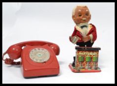 A vintage retro 20th Century battery operated tin