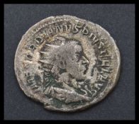 A Roman silver coin featuring an emperor bust with