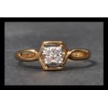 A hallmarked 9ct gold and white stone ring having