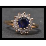 A hallmarked 9ct gold white and blue stone ring se