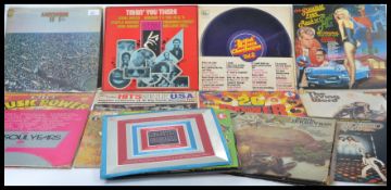 A collection of vinyl long play LP records featuri