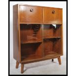 A 1960's / mid century teak wood cocktail cabinet