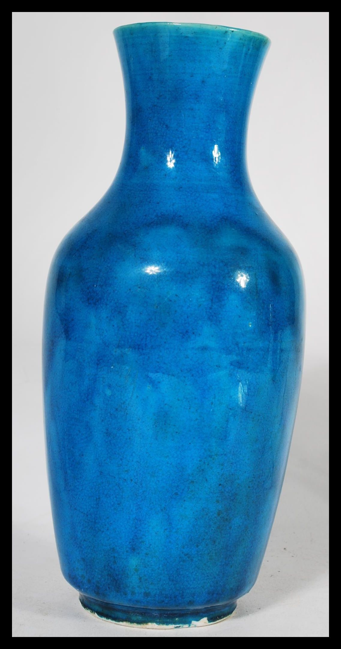 A 19th century Chinese monochrome bottle vase, glazed in merging tones of vibrant blue, elongated - Image 3 of 6