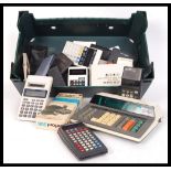 A large collection of vintage 20th Century desktop / pocket and scientific calculator and personal