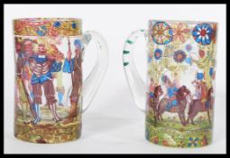 A pair of 20th century German glass tankards steins having hand painted decoration depicting court