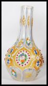 A 19th century Czech Bohemian in the manner of Moser glass vase of baluster form, with enamel and