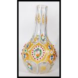 A 19th century Czech Bohemian in the manner of Moser glass vase of baluster form, with enamel and