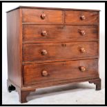 A Georgian 19th century mahogany chest of drawers having knob handles with a 2 short over 3 deep