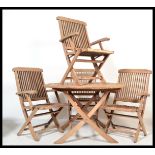 A good quality teak wood garden table and chairs - patio suite. The circular table and chairs all