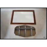 A collection of vintage and retro mirrors to include teak frameless examples, Art Deco style