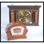 A 1920's oak wall barometer with circular dial set on oak square backing together with a 1930's