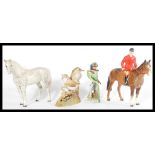 A collection of 20th Century ceramic figures to include Beswick horses, a Crown Derby Thrush and a