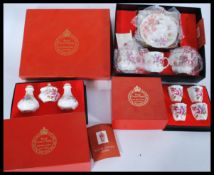 A collection of boxed Royal Crown Derby porcelain to include a set of 4 boxed cups, a boxed tea